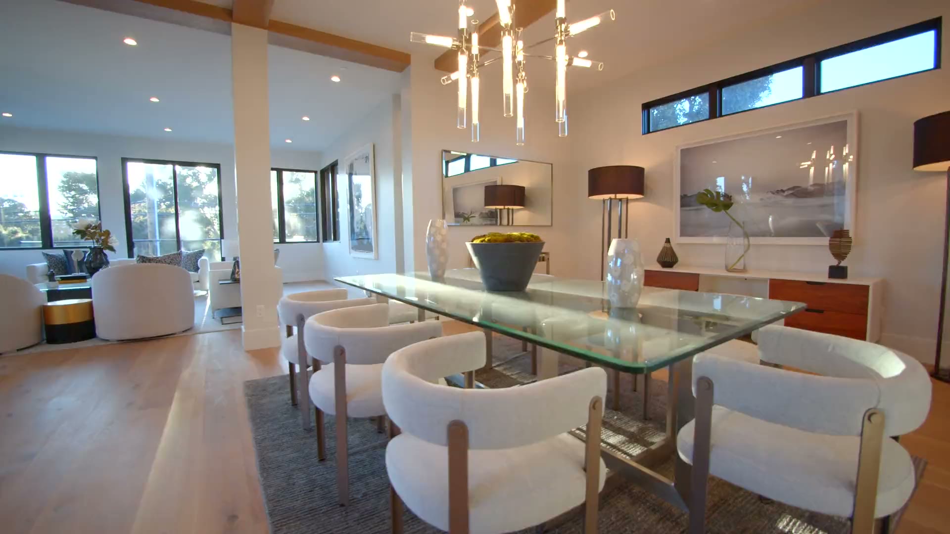 A bright open-plan dining room with vaulted ceilings